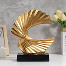 Escultura Abstrata Onda Dourada em Resina com Base Preta Lenogue