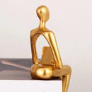 Escultura Abstrata Pensador em Resina Dourada para Sala e Escritório Lenogue