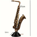 Ornamento Decorativo de Resina Violino e Saxofone Dourado Lenogue
