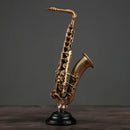 Ornamento Decorativo de Resina Violino e Saxofone Dourado Lenogue
